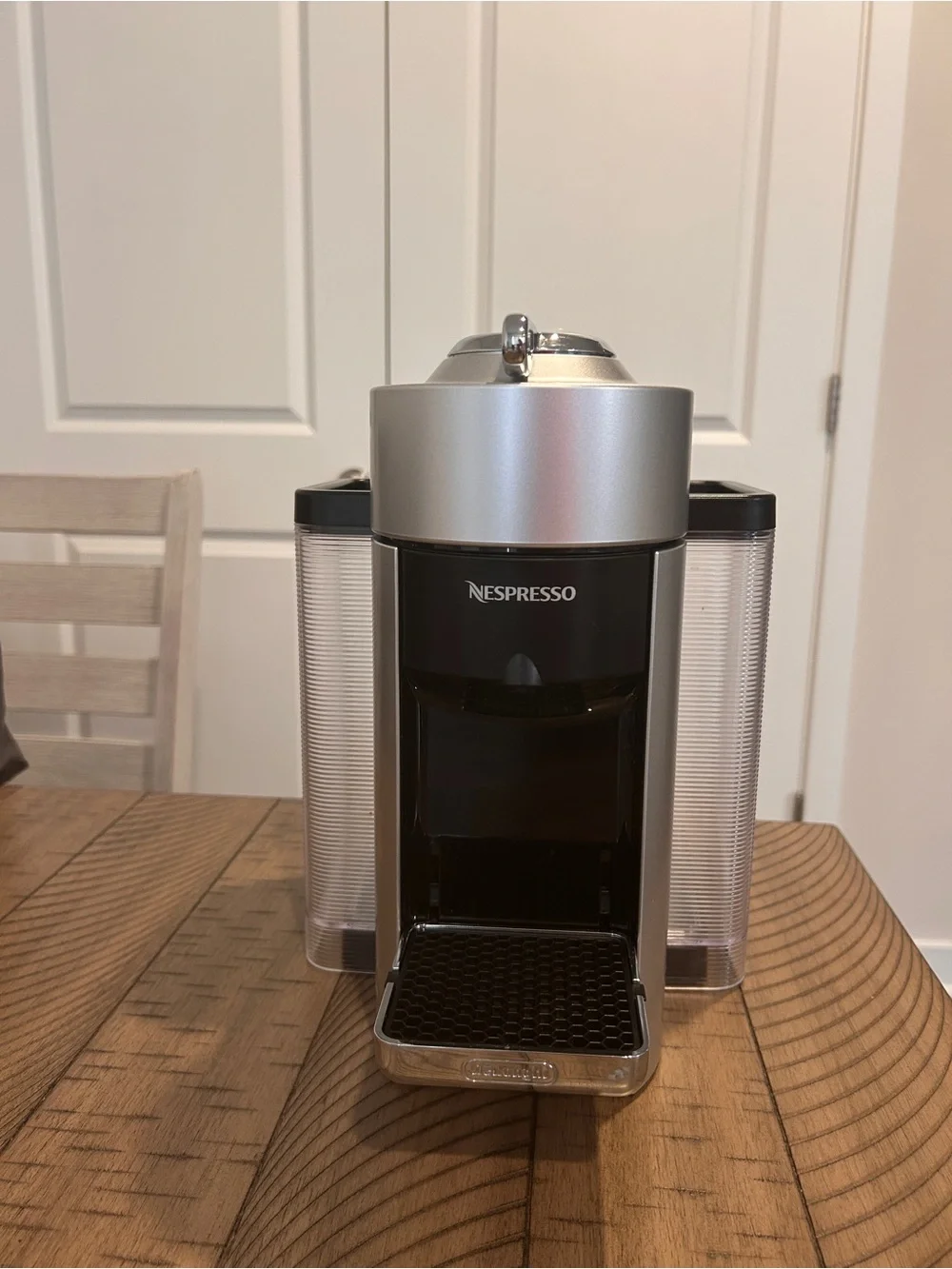 Nespresso Espresso Machine in Silver and Black with Clear Water Tanks